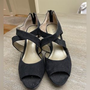 Black heels with zipper back. Size 6